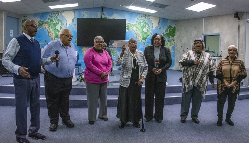 Sussex Community Choir offers an a cappella performance for the Jubilee Day celebration.